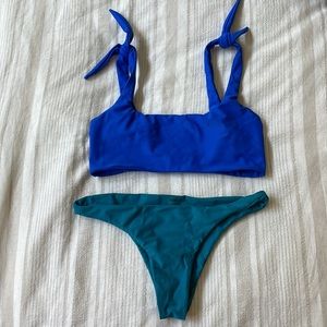 MIKOH Jamaica Tie Shoulder Top in Bright Blue. Mikyako Bottoms in Aqua.